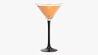 Martini glass with orange juice