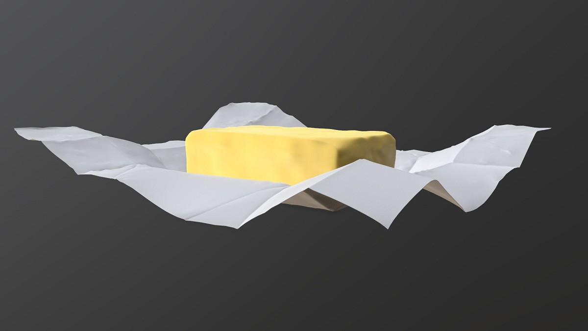 Butter with paper on ground