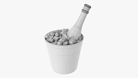 Champagne bottle in glass bucket with ice