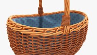 Empty oval wicker basket with handle