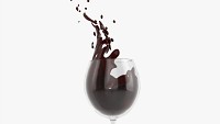 Wine glass with red wine splashing out