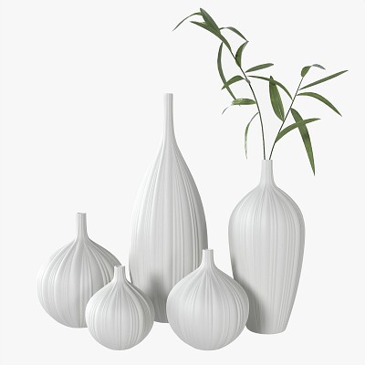 White vases with plants