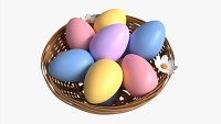 Easter Eggs in Wicker Basket Composition