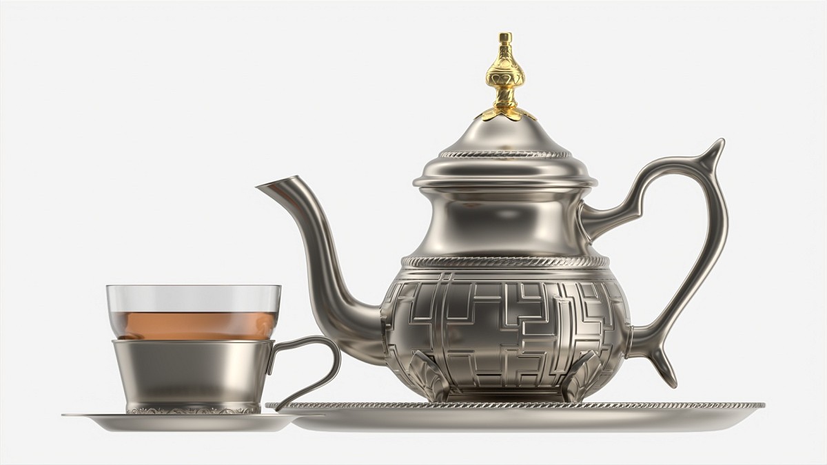 Silver Teapot and Cup with Tea