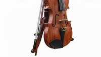Violin with bow and wooden music note stand