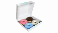 Cardboard box with donuts open