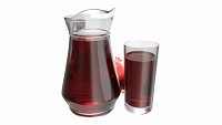 Jug and glass with pomegranate juice and fruit