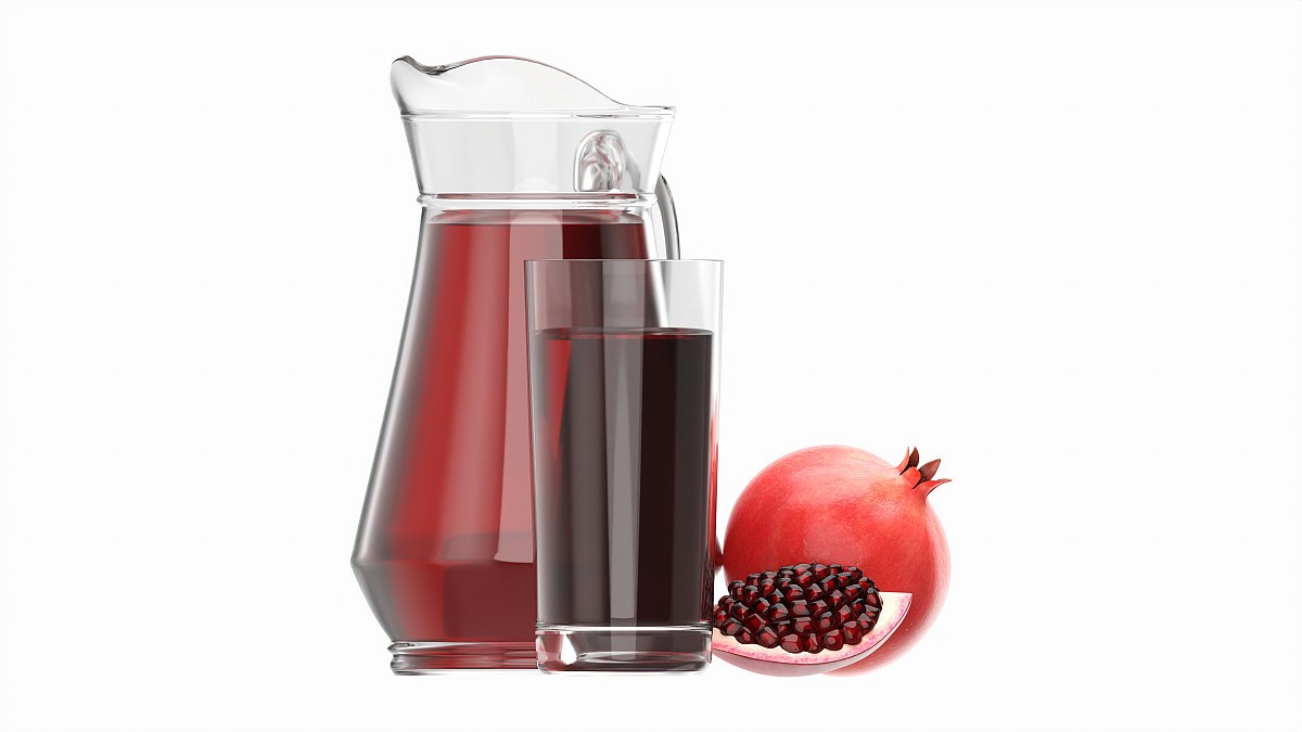 Jug and glass with pomegranate juice and fruit