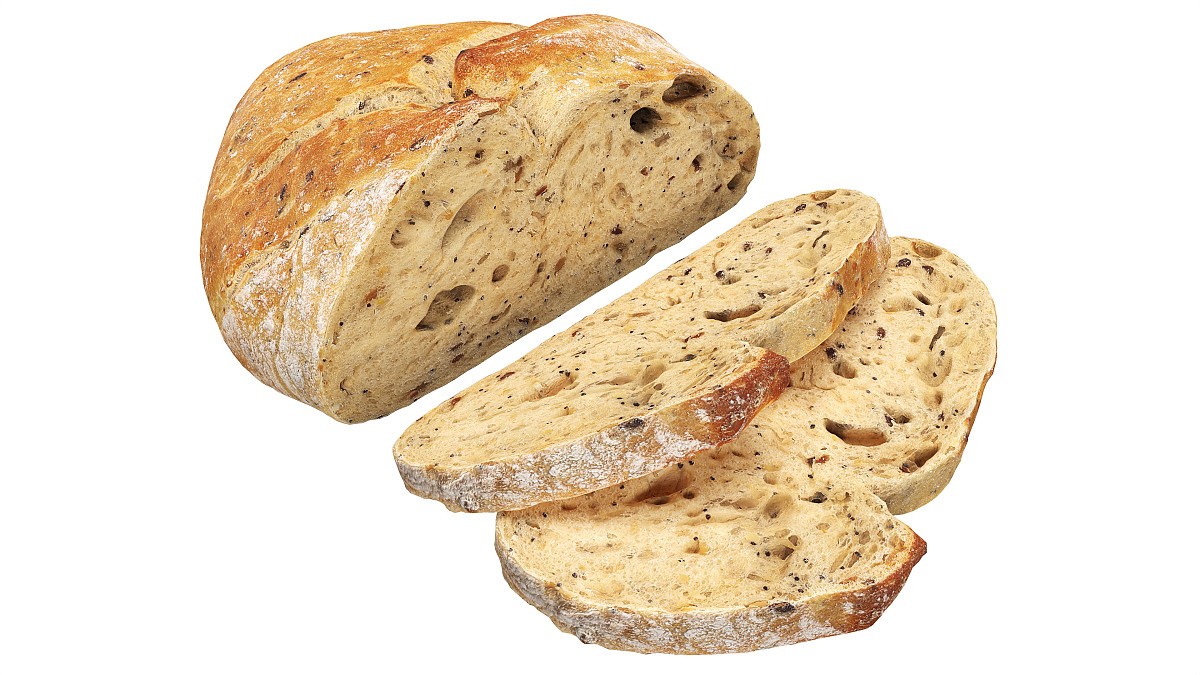 Loaf of artisanal white bread cutted