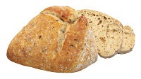 Loaf of artisanal white bread cutted