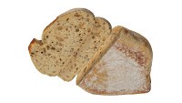 Loaf of artisanal white bread cutted