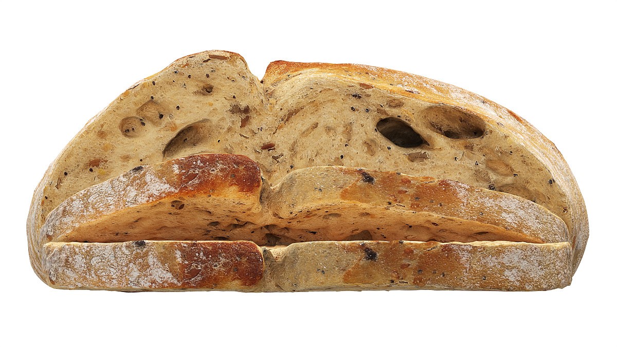 Loaf of artisanal white bread cutted