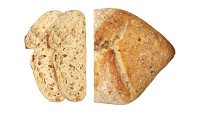 Loaf of artisanal white bread cutted