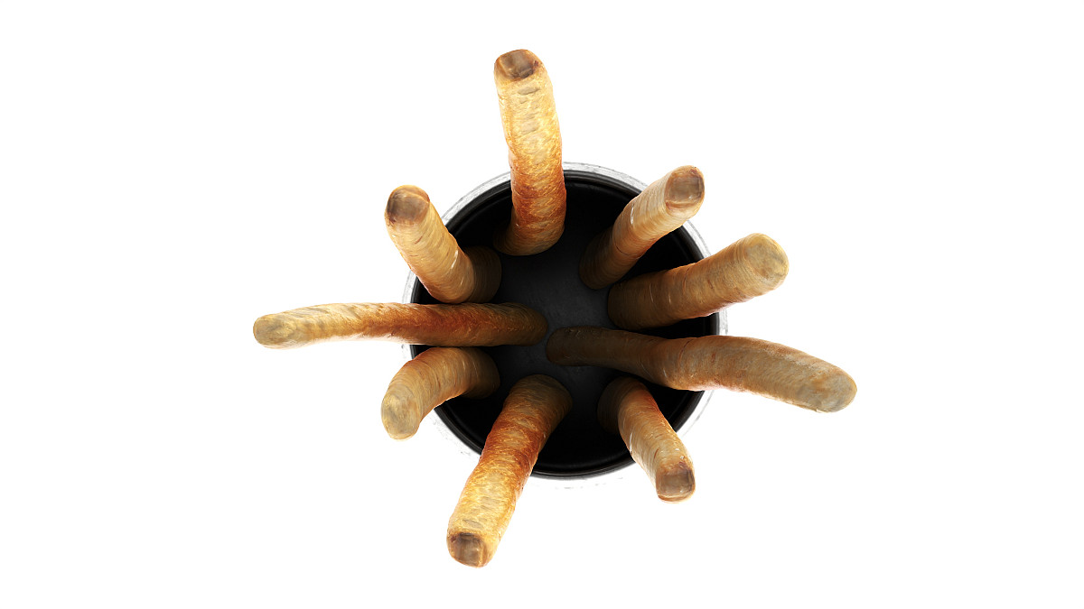 Crispy bread sticks in cup